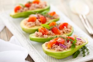 Avocado, tuna, and tomato salad photo by Vitalina Rybakova
