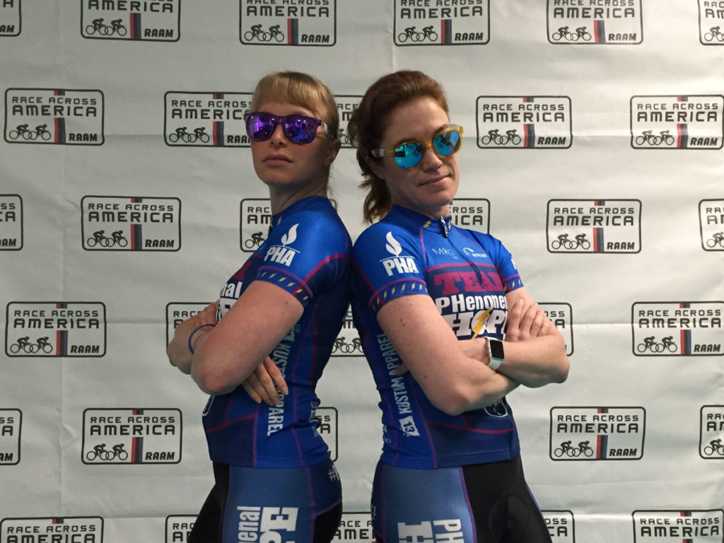 Two Team PH athletes wearing sun glasses and posing like cool kids