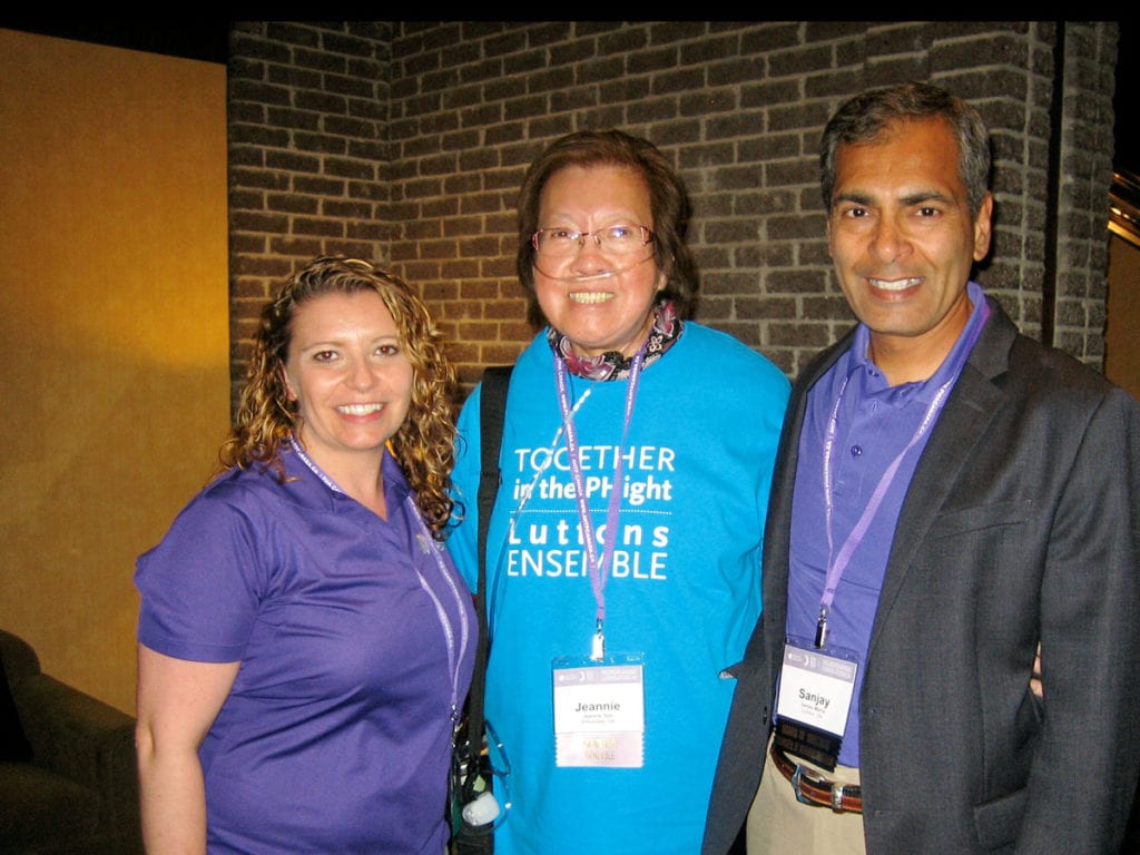 Jeannie Tom and two friends at a conference