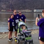 Anna Lindner with her folks on the north shore of Pittsburgh during the annual PH5k race