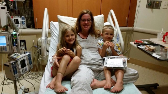 Becca visited by her children while in the hospital